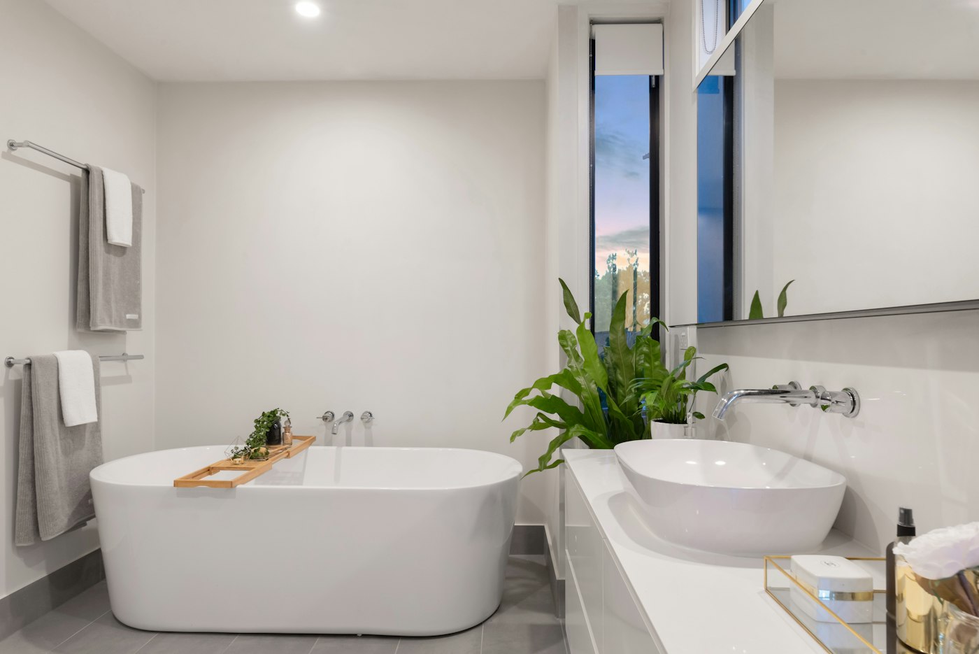 Bathroom with fixtures and a mirror